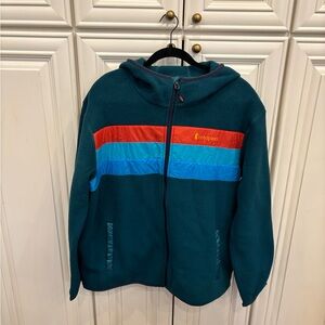 Cotopaxi Green Fleece Jacket with Orange and Blue Accents